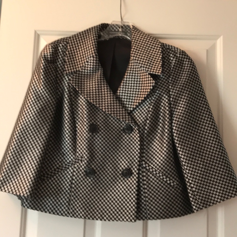 Shiny black and silver short blazer.